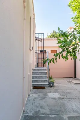 a set of stairs leading up to a building at Villetta Hilda by Wonderful Italy in Mondello