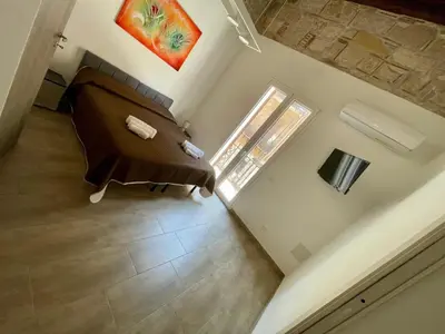an overhead view of a living room with a couch at Baron’s Suites in Palermo