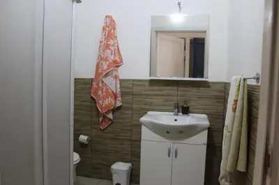 a bathroom with a sink and a mirror at La Melagrana in Castellammare del Golfo