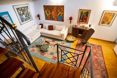 an overhead view of a living room with a couch at La Terrazza Sullo Spasimo in Palermo