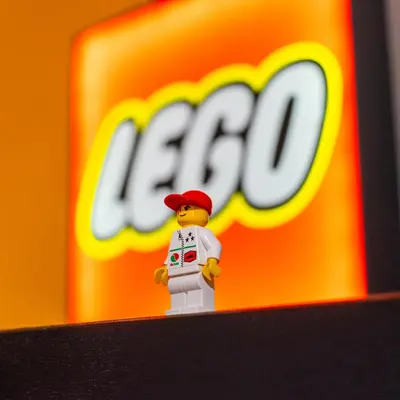 a lego man standing in front of a lego sign at LEGO36 Apartment in Palermo