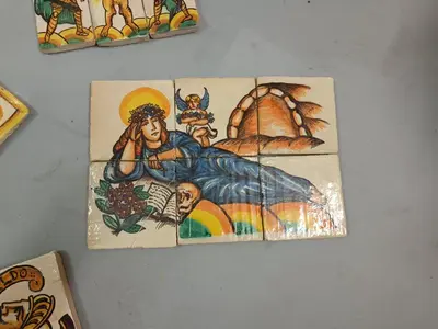 a group of tiles with a painting on them at NONNA ADRIANA in Terrasini