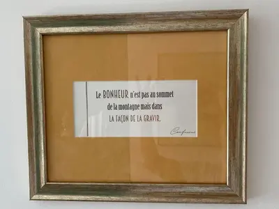 a framed picture of a piece of paper in a frame at Dimora D'aumale in Palermo