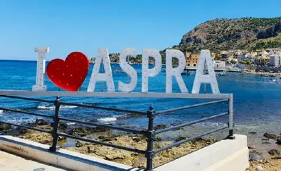 a sign that says acapulco with a red heart at Casa del mare Mely in Ficarazzi