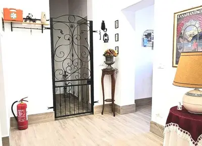 a room with a black iron gate in a room at Appartamento Vista Stazione in Palermo