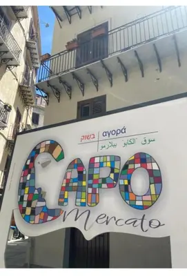 a sign on the side of a building at Dome Suite La Cupoletta in Palermo