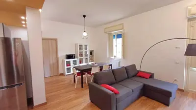 a living room with a couch and a table at Palermo case vacanza in Palermo