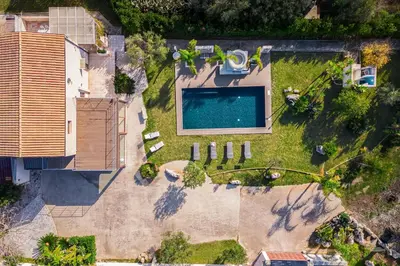 an overhead view of a backyard with a swimming pool at Villa DellAlbero in Alcamo