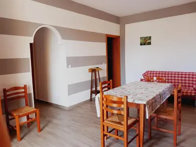 a dining room with a table and chairs at Residence Marino in Balestrate