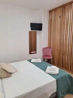 a kitchen and dining room with a table and chairs at Antò 2.0 in Castellammare del Golfo