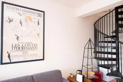 a living room with a movie poster on the wall at Casa Za Lisa con Vista Mare a Macari in Macari