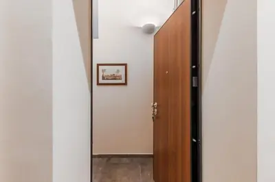 a bathroom with a shower and a toilet and a sink at Palazzo Falcone Apartments in Palermo
