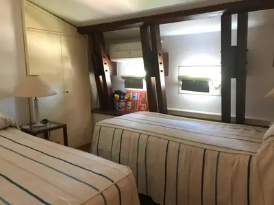 a hotel room with a bed and a window at Relaxing seahouse in Santa Flavia