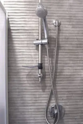 a shower head on the side of a wall at Appartamento della macina CIR 19081005C212931 in Castellammare del Golfo