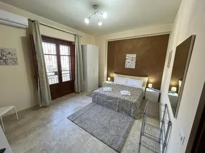 a small room with a bed and a window at Sweet Home Pietro e Lia by Holiday World in Casteldaccia