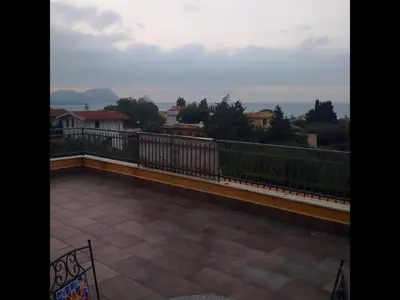 a balcony with a view of a city at Doppia villa indipendente/clara in Mandra Capreria