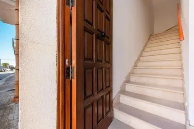 an open door to a stairway with a set of stairs at Marconi in San Vito lo Capo