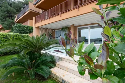 a house with plants in front of it at Addaura Home in Palermo