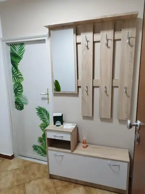 a dressing room with a mirror and a dressing table at Montesanto Home in Palermo