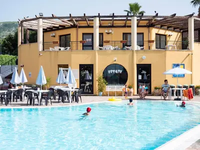 a group of people in the swimming pool at a hotel at VILLA ANGELA TRABIA in Trabia