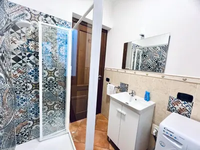 a bathroom with a shower and a sink at Casa Carlotta Apartments in Terrasini