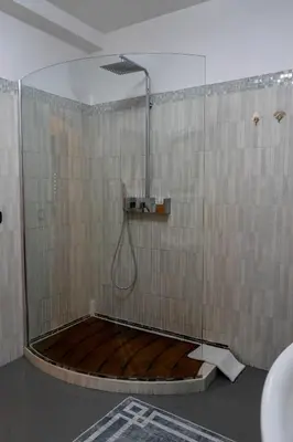 a shower with a shower head in a bathroom at Le Case Di Romeo Alla Vucciria in Palermo