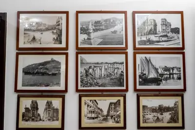 a group of pictures hanging on a wall at Le Case Di Romeo Alla Vucciria in Palermo