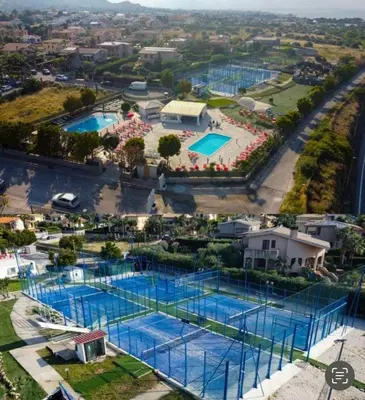 an overhead view of two pools at a resort at Casita Garden&Spa in Carini