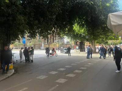 a group of people walking down a street at Maqueda Vibes in Palermo