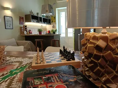 a chess board on a table in a living room at We # Are ai Cassarelli in Palermo