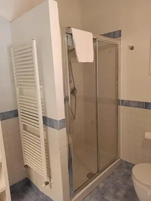 a bathroom with a shower and a toilet at We # Are ai Cassarelli in Palermo
