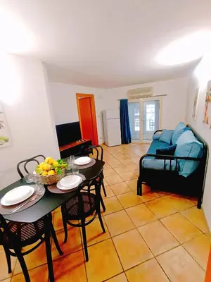 a bathroom with a toilet and a sink at Quattro Canti - residenza Santa Caterina in Palermo