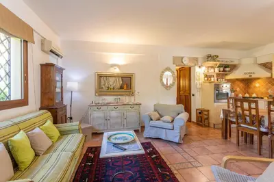 a living room with a couch and a table at Villa Cecilia in Cinisi