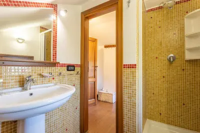 a bathroom with a sink and a shower at Villa Cecilia in Cinisi