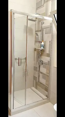 a shower with a glass door in a bathroom at Casa L'ORIZZONTE in Balestrate