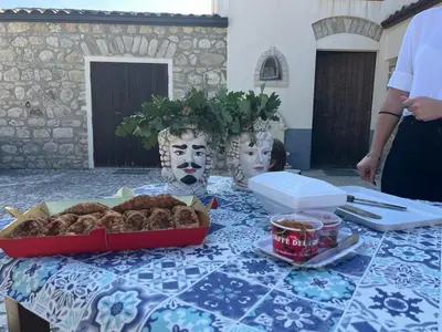 a table with a box of food on top of it at Fattoria F.lli Marsolo in Chiusa Sclafani