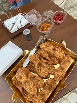 a table with a tray of food on a table at Fattoria F.lli Marsolo in Chiusa Sclafani