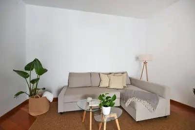 a living room with a couch and two tables at iFlat Casa Viscuttara in Palermo