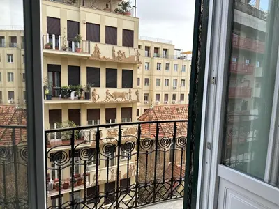 a balcony with a view of a building at Victoria's Apartment in Palermo
