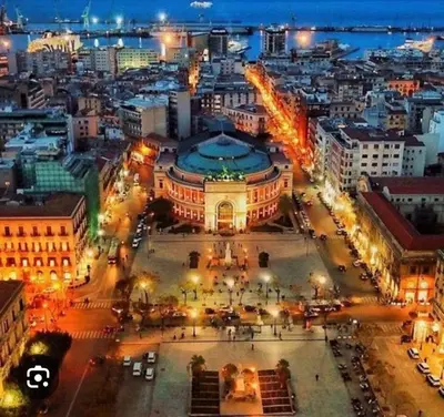 a view of a city at night at Casa Gabriele in Palermo