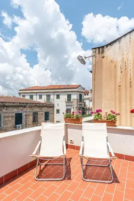 two chairs on the roof of a building at Casa Brunaccini con Terrazza by Wonderful Italy in Palermo