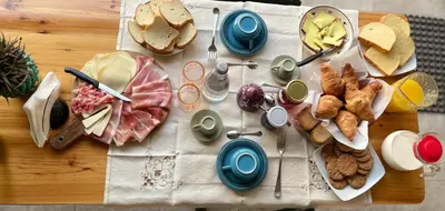 a table with a bunch of different types of food at Orto Raccolto in Termini Imerese