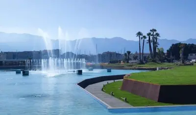 a fountain in the middle of a body of water at Shell Maqueda in Palermo