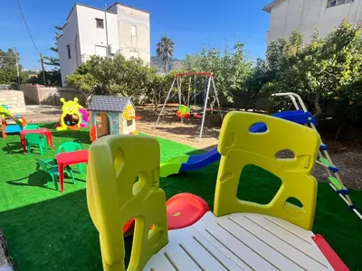 a bedroom with a bed and a brick wall at La Chicca di Milu' for Pet Lovers in Alcamo