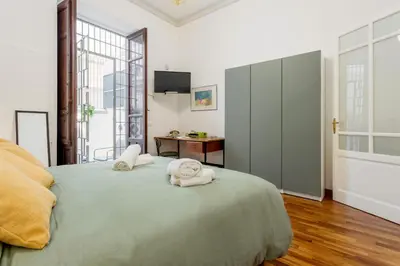 a hallway with a door leading to a dining room at Cicco's Home - Holidays Apartment in Palermo