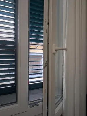 a white bathroom with a sink and a toilet at Il Bel Canto - Suite in centro storico in Palermo