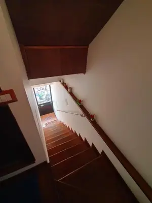 a staircase in a house with a stair case at A casa scalilla 2 in Palermo