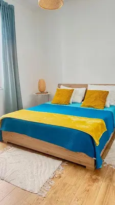 a living room with a couch and a table at N&L Apartments Palermo in Palermo