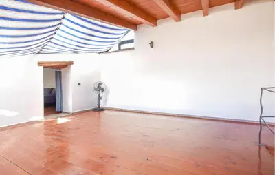a room with a wooden floor and a ceiling at Amazing Home In Trappeto With Wifi in Trappeto