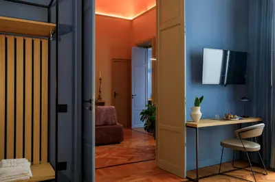 a hallway with a room with a desk and a chair at Belmonte LR Collection in Palermo